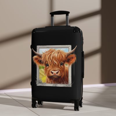 Highland Cow Suitcase - A stylish luggage featuring a charming cow design, perfect for travelers who want to bring a touch of whimsy to their journeys.