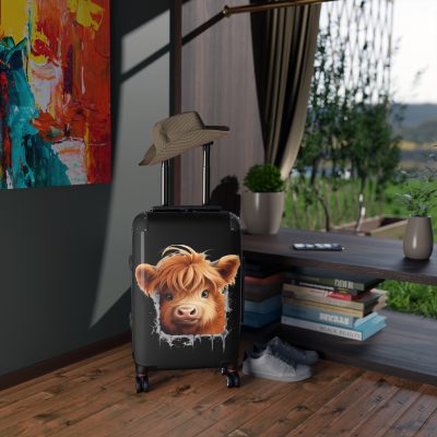 Highland Cow Suitcase - A stylish luggage featuring a charming cow design, perfect for travelers who want to bring a touch of whimsy to their journeys.