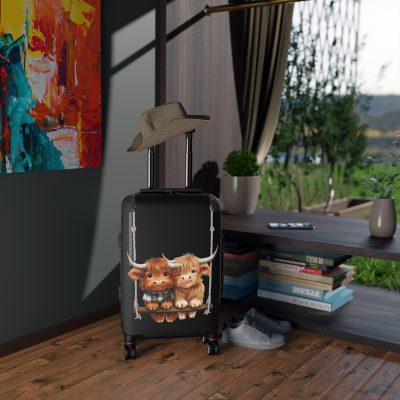 Highland Cow Suitcase - A stylish luggage featuring a charming cow design, perfect for travelers who want to bring a touch of whimsy to their journeys.