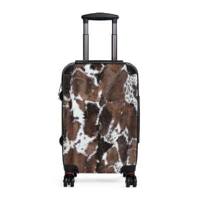 Cowhide Suitcase - A stylish luggage featuring a chic cowhide design, perfect for travelers who want to add a touch of luxury to their journeys