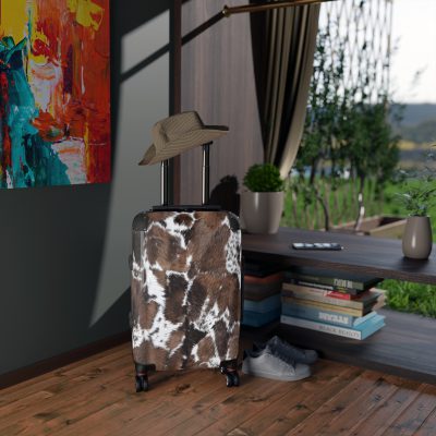 Cowhide Suitcase - A stylish luggage featuring a chic cowhide design, perfect for travelers who want to add a touch of luxury to their journeys