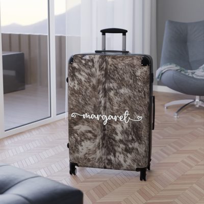 Custom Cowhide Suitcase - A personalized luggage adorned with a unique design, perfect for travelers who want to add a touch of individuality to their journeys.