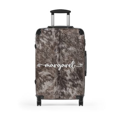 Custom Cowhide Suitcase - A personalized luggage adorned with a unique design, perfect for travelers who want to add a touch of individuality to their journeys.