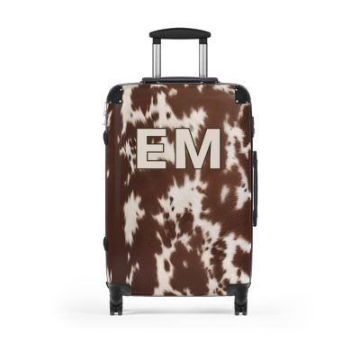 Custom Cowhide Suitcase - A personalized luggage adorned with a unique design, perfect for travelers who want to add a touch of individuality to their journeys.