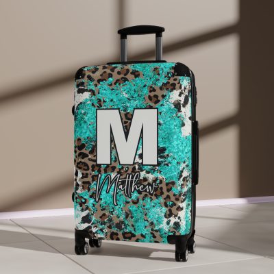Custom Western Cowhide Suitcase - A personalized luggage adorned with a unique design, perfect for travelers who want to add a touch of individuality to their journeys.