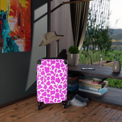 Cow Print Suitcase - A stylish luggage featuring a chic cow print design, perfect for travelers who want to add a touch of luxury to their journeys.