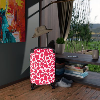 Cow Print Suitcase - A stylish luggage featuring a chic cow print design, perfect for travelers who want to add a touch of luxury to their journeys.