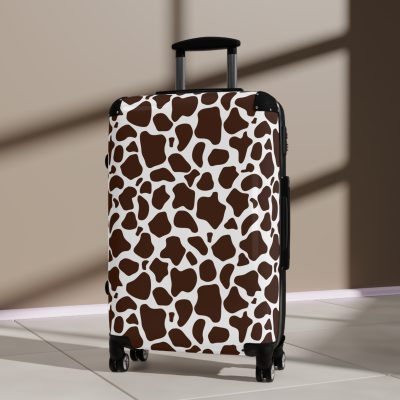 Cow Print Suitcase - A stylish luggage featuring a chic cow print design, perfect for travelers who want to add a touch of luxury to their journeys.