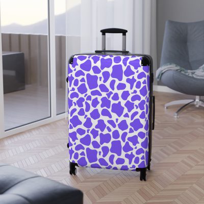 Cow Print Suitcase - A stylish luggage featuring a chic cow print design, perfect for travelers who want to add a touch of luxury to their journeys.