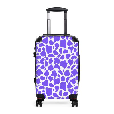 Cow Print Suitcase - A stylish luggage featuring a chic cow print design, perfect for travelers who want to add a touch of luxury to their journeys.