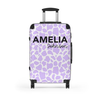 Custom Cow Print Suitcase - A personalized luggage adorned with a unique cow print design, perfect for travelers who want to add a touch of individuality to their journeys.