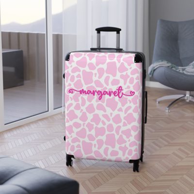 Custom Cow Print Suitcase - A personalized luggage adorned with a unique cow print design, perfect for travelers who want to add a touch of individuality to their journeys.