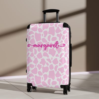 Custom Cow Print Suitcase - A personalized luggage adorned with a unique cow print design, perfect for travelers who want to add a touch of individuality to their journeys.