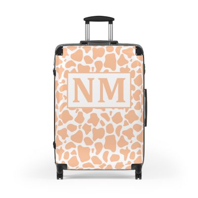 Custom Cow Print Suitcase - A personalized luggage adorned with a unique cow print design, perfect for travelers who want to add a touch of individuality to their journeys.