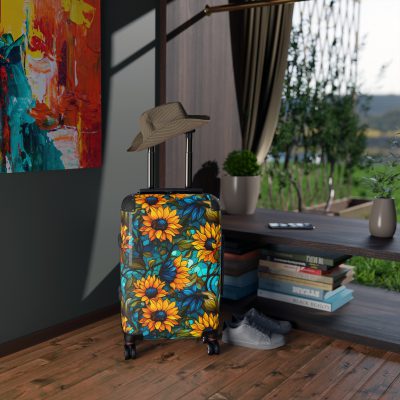 Sunflower Suitcase - A luggage adorned with a bright sunflower design, perfect for travelers who want to bring a touch of cheer and floral beauty to their journeys.