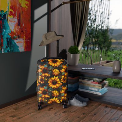 Sunflower Suitcase - A luggage adorned with a bright sunflower design, perfect for travelers who want to bring a touch of cheer and floral beauty to their journeys.