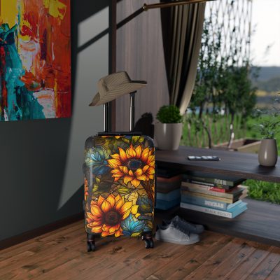 Sunflower Suitcase - A luggage adorned with a bright sunflower design, perfect for travelers who want to bring a touch of cheer and floral beauty to their journeys.