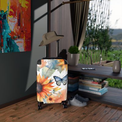 Butterfly Sunflower Suitcase - A luggage adorned with a bright sunflower and butterfly design, perfect for travelers who want to bring a touch of nature and cheer to their journeys.