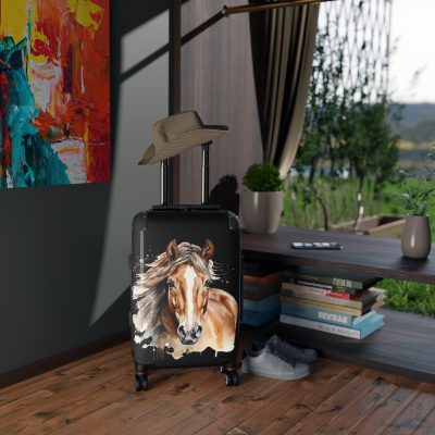 Horse Suitcase - A luggage adorned with a captivating horse-themed design, perfect for travelers who want to add a touch of equestrian elegance to their journeys.