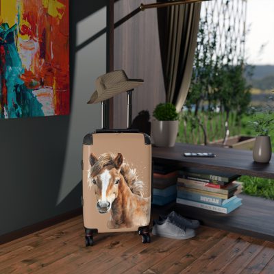 Horse Suitcase - A luggage adorned with a captivating horse-themed design, perfect for travelers who want to add a touch of equestrian elegance to their journeys.