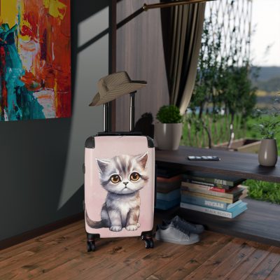 Cat Suitcase - A luggage adorned with a charming cat-themed design, perfect for travelers who want to add a touch of feline charm to their journeys.