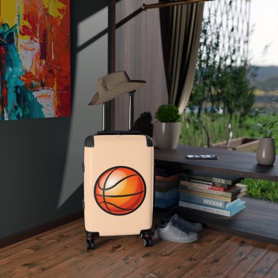 Basketball Suitcase - A luggage adorned with a sporty basketball-themed design, perfect for sports enthusiasts who want to travel in style with their favorite sport.