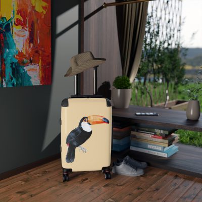 Toucan Suitcase - A unique travel gear featuring an exotic bird design, perfect for adventurers and bird enthusiasts, adding an adventurous touch to your journeys.