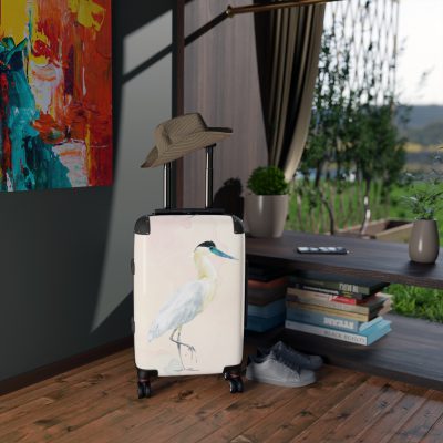 Crane Suitcase - An elegant travel gear featuring a bird-inspired design, perfect for those who appreciate sophistication on their journeys.