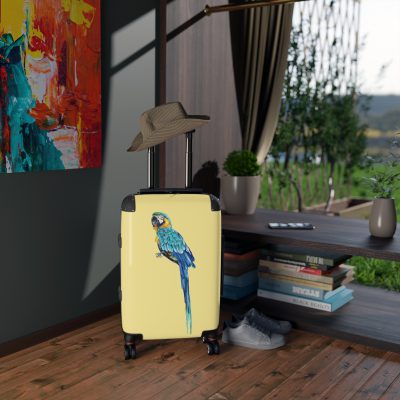 Macaw Suitcase - A vibrant travel gear featuring a tropical bird-inspired design, perfect for those who appreciate exotic and colorful styles on their journeys.