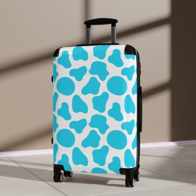 Cow Print Suitcase - A stylish luggage featuring a chic cow print design, perfect for travelers who want to add a touch of luxury to their journeys.