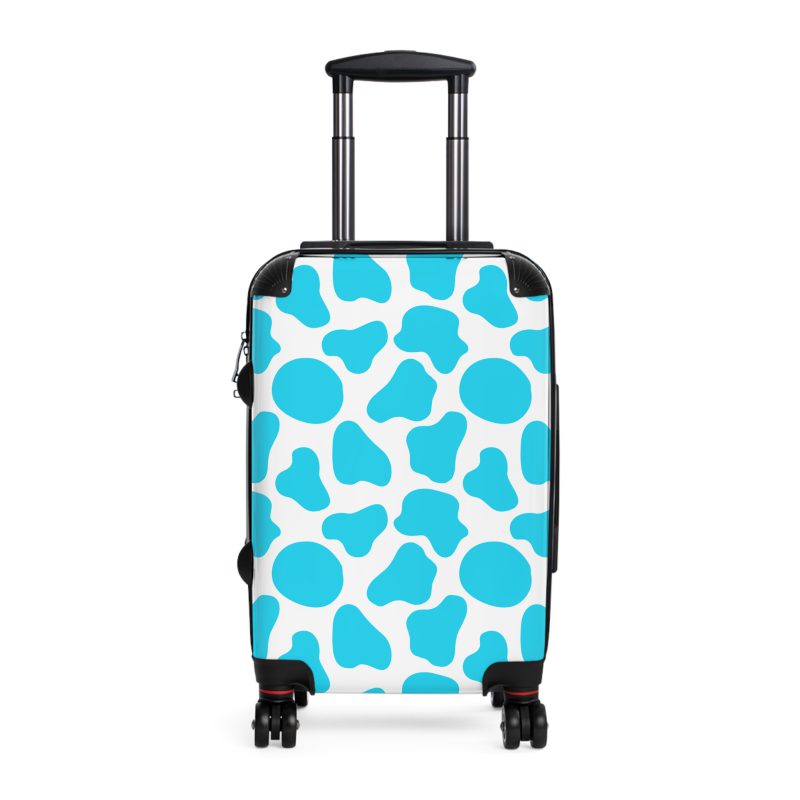 Cow Print Suitcase - A stylish luggage featuring a chic cow print design, perfect for travelers who want to add a touch of luxury to their journeys.