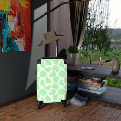 Cow Print Suitcase - A stylish luggage featuring a chic cow print design, perfect for travelers who want to add a touch of luxury to their journeys.