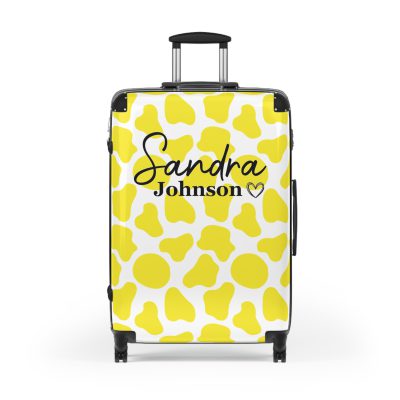 Custom Cow Print Suitcase - A personalized luggage adorned with a unique cow print design, perfect for travelers who want to add a touch of individuality to their journeys.