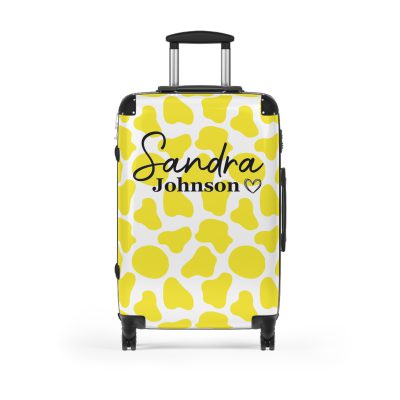 Custom Cow Print Suitcase - A personalized luggage adorned with a unique cow print design, perfect for travelers who want to add a touch of individuality to their journeys.