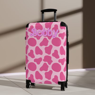 Custom Cow Print Suitcase - A personalized luggage adorned with a unique cow print design, perfect for travelers who want to add a touch of individuality to their journeys.