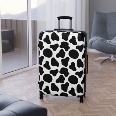 Cow Print Suitcase - A stylish luggage featuring a chic cow print design, perfect for travelers who want to add a touch of luxury to their journeys.