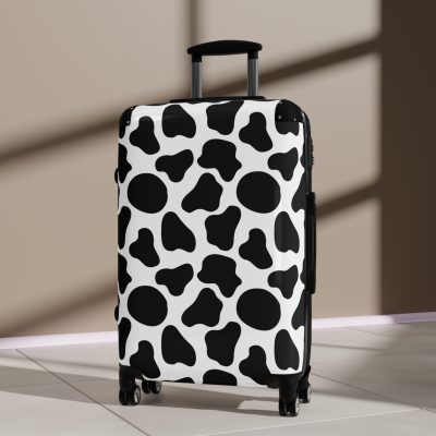 Cow Print Suitcase - A stylish luggage featuring a chic cow print design, perfect for travelers who want to add a touch of luxury to their journeys.