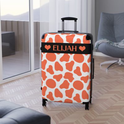 Custom Cow Print Suitcase - A personalized luggage adorned with a unique cow print design, perfect for travelers who want to add a touch of individuality to their journeys.