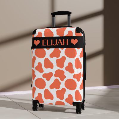 Custom Cow Print Suitcase - A personalized luggage adorned with a unique cow print design, perfect for travelers who want to add a touch of individuality to their journeys.