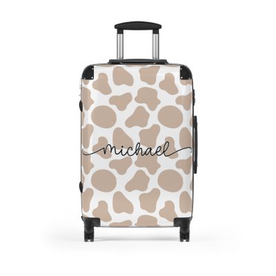 Custom Cow Print Suitcase - A personalized luggage adorned with a unique cow print design, perfect for travelers who want to add a touch of individuality to their journeys.