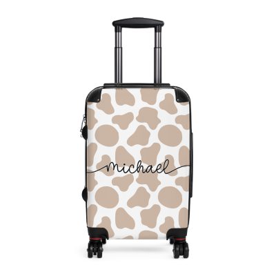 Custom Cow Print Suitcase - A personalized luggage adorned with a unique cow print design, perfect for travelers who want to add a touch of individuality to their journeys.