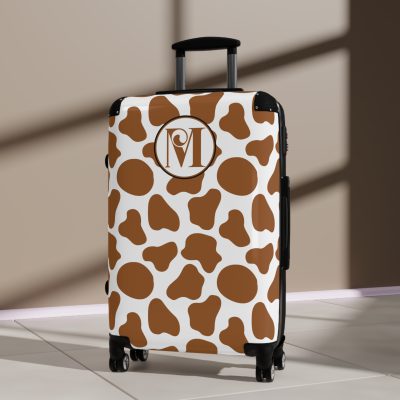 Custom Cow Print Suitcase - A personalized luggage adorned with a unique cow print design, perfect for travelers who want to add a touch of individuality to their journeys.