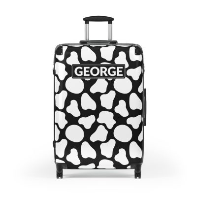 Custom Cow Print Suitcase - A personalized luggage adorned with a unique cow print design, perfect for travelers who want to add a touch of individuality to their journeys.