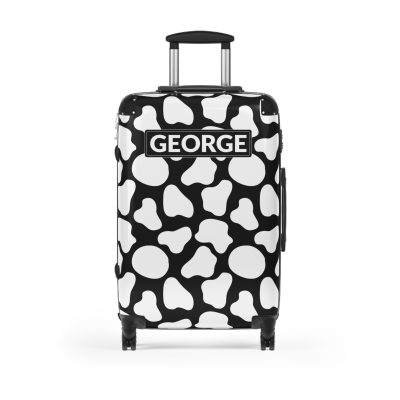 Custom Cow Print Suitcase - A personalized luggage adorned with a unique cow print design, perfect for travelers who want to add a touch of individuality to their journeys.