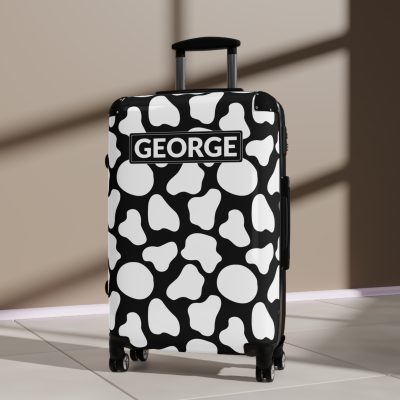 Custom Cow Print Suitcase - A personalized luggage adorned with a unique cow print design, perfect for travelers who want to add a touch of individuality to their journeys.