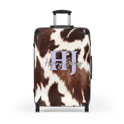 Custom Cowhide Suitcase - A personalized luggage adorned with a unique design, perfect for travelers who want to add a touch of individuality to their journeys.