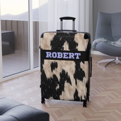 Custom Cowhide Suitcase - A personalized luggage adorned with a unique design, perfect for travelers who want to add a touch of individuality to their journeys.