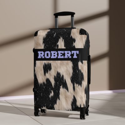 Custom Cowhide Suitcase - A personalized luggage adorned with a unique design, perfect for travelers who want to add a touch of individuality to their journeys.