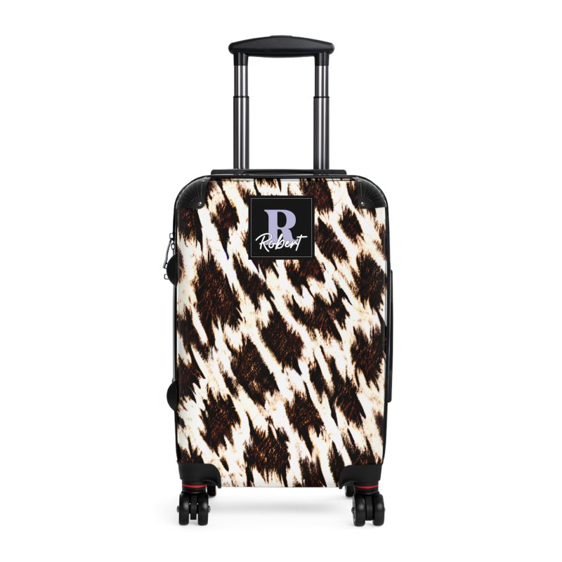 Custom Cowhide Suitcase - A personalized luggage adorned with a unique design, perfect for travelers who want to add a touch of individuality to their journeys.