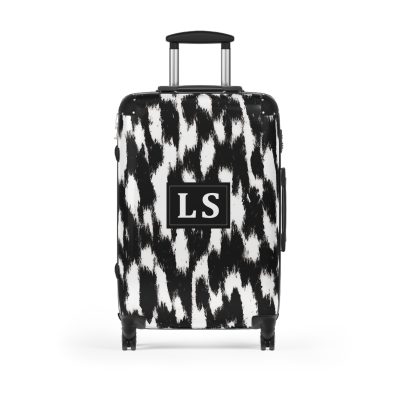 Custom Cowhide Suitcase - A personalized luggage adorned with a unique design, perfect for travelers who want to add a touch of individuality to their journeys.